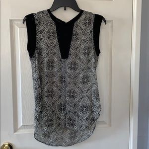 Black and white top. It doesn’t fit any more.